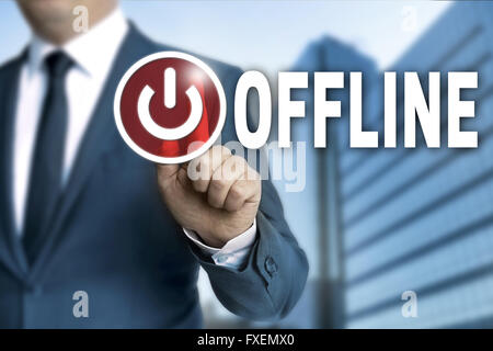 offline touchscreen is operated by businessman. Stock Photo