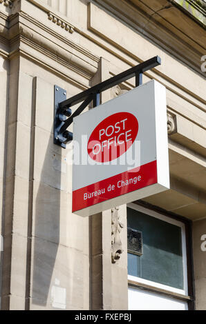 Sign for Post Office and Bureau de Change hanging outside Moseley Post Office Stock Photo