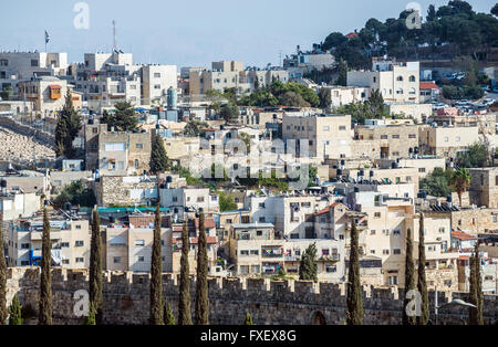 apartment houses on the hills of Silwan neighborhood on the outskirts of the Old City of Jerusalem, Israel. Temple Mount walls o Stock Photo
