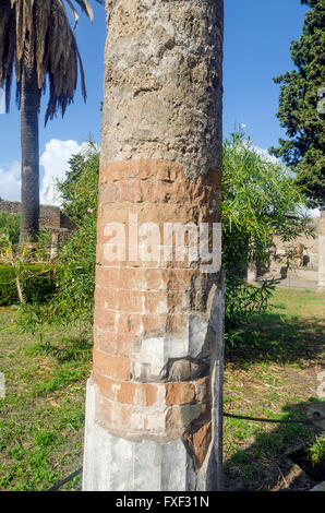 Detail of Roman brick column or pillar with partial plaster coating Pompeii Italy Stock Photo