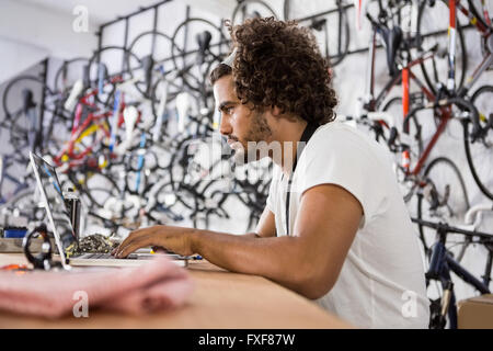 Worker using laptop Stock Photo