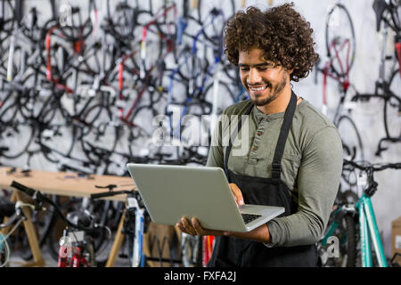 Worker using laptop Stock Photo