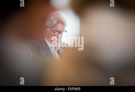 Detmold, Germany. 15th Apr, 2016. Defendant Reinhold Hanning attends another day of his trial in Detmold, Germany, 15 April 2016. The court was set up in the rooms of the Chamber of Industry and Commerce in Detmold. Reinhold Hanning, a 94-year-old World War II SS guard is facing a charge of being an accessory to at least 170,000 murders at Auschwitz concentration camp. Prosecutors state that he was a member of the SS 'Totenkopf' (Death's Head) Division and that he was stationed at the Nazi regime's death camp between early 1943 and June 1944. Photo: Friso Gentsch/dpa/Alamy Live News Stock Photo