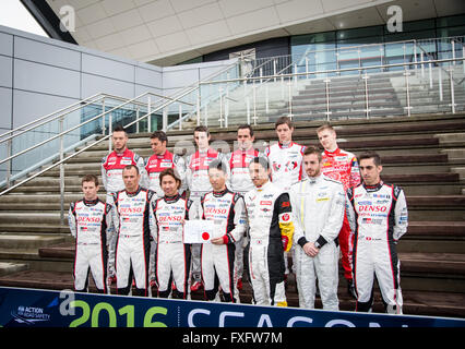 Silverstone, UK. 15th Apr, 2016. WEC drivers holding a sign saying pray for Japan showing their support after earthquakes hit Japan Credit:  steven roe/Alamy Live News Stock Photo