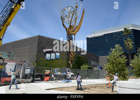 North Hollywood, California, USA. 15th Apr, 2016. The world's largest Emmy statuette as she makes her hour-long journey along California Highway 101 from East Los Angeles to her new home at the Television Academy's North Hollywood campus. Nearly one year in the making, the 18-foot tall, 1750 pound golden Emmy replica depicts the winged muse of art holding an electron atom. Cast in pure silicon bronze, she was painstakingly created by 45 separate craftsmen. © Gene Blevins/ZUMA Wire/Alamy Live News Stock Photo