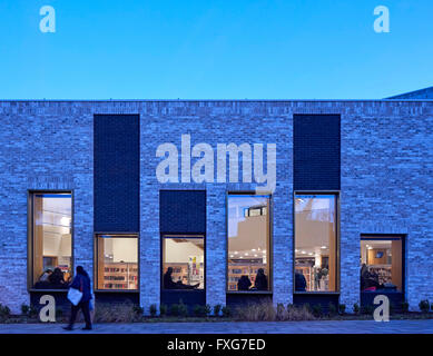 Side view at dusk. Camberwell Library, London, United Kingdom. Architect: John McAslan & Partners, 2016. Stock Photo