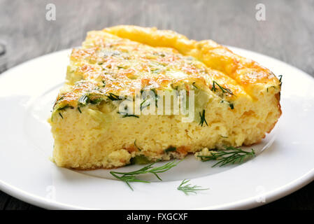 Omelet on white plate, close up view Stock Photo