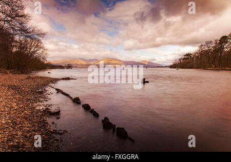 Image of a long exposure landscape at the lake. Loch Lomond, Scotland. Stock Photo