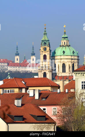 Prague, Czech Republic. St Nicholas Church (Kostel svatého Mikuláše - 1755, Baroque) in Mala strana, seen from across the river. Stock Photo