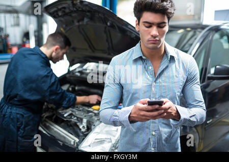 Customer text messaging on the mobile Stock Photo