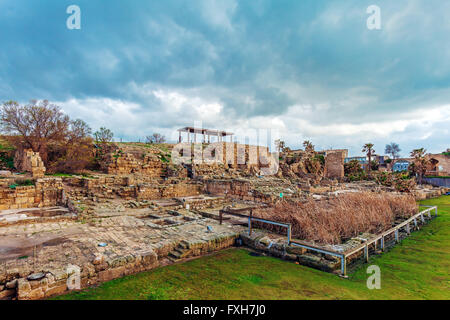 Ruins of Antique Harbor before Sunset, Caesarea Maritima, Israel Stock Photo