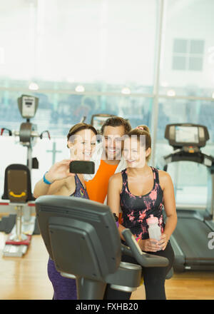 Friends taking selfie at gym Stock Photo