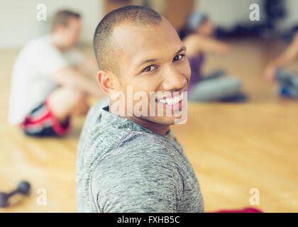 Portrait smiling man in exercise class Stock Photo
