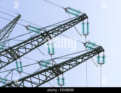 Traverses at a tension tower of a high-voltage line Stock Photo