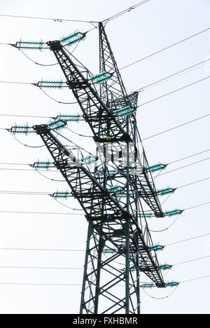 Tension tower with traverses of a high-voltage line Stock Photo