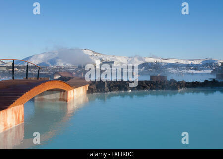 Tourists bathing in Blue Lagoon, rich in minerals like silica and sulfur in winter, Grindavík, Reykjanes Peninsula, Iceland Stock Photo