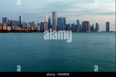 Chicago skyline at sunrise as seen from the Museum Campus Chicago, Illinois, United States of America Stock Photo