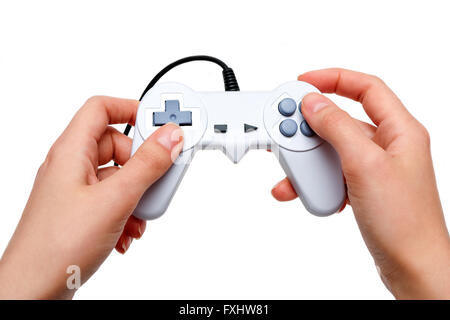 White game controller in hands Stock Photo