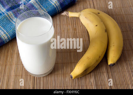 Bananas and glass of milk Stock Photo