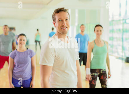 Portrait smiling man in exercise class Stock Photo