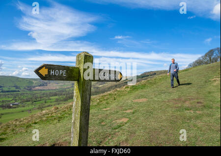 Wooden sign post showing directions to Hope and Lose Hill, part of the footpath to Mam Tor, in the Peak District, Derbyshire. Stock Photo