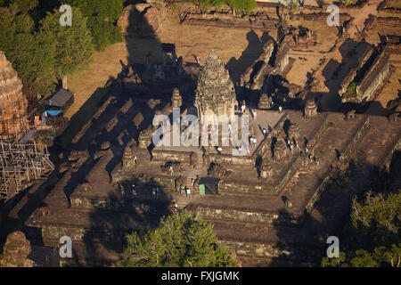 Bakong temple ruins (from 9th century AD), in Roluos Temple Group, Angkor World Heritage Site, near Siem Reap, Cambodia - aerial Stock Photo
