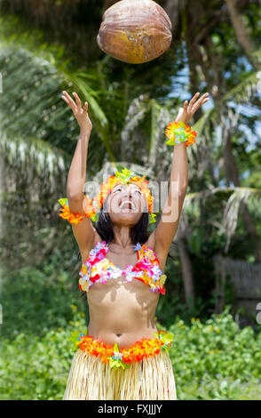 Hawaii hula dancer throw with coconut Stock Photo