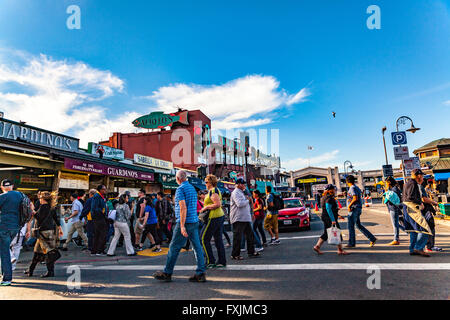 Pier 39, Fisherman's Wharf area of San Francisco with many tourists on a warm sunny Saturday afternoon in April 2016 Stock Photo