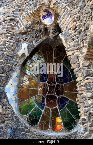 Stained glass windows seen from outside Colonia Guell in Barcelona, Spain Stock Photo