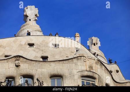 Unusual chimneys and wavy lines of the Casa Mila, Barcelona, Spain Stock Photo