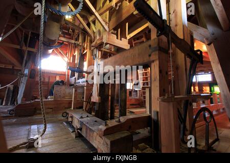 The windmills at Zaanse Schans in The Netherlands mill timber. Stock Photo