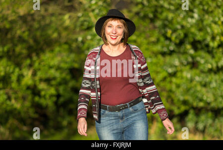 portrait of middle age woman outdoors Stock Photo