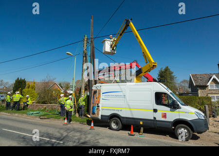 engineers working on electricity supply pole Stock Photo