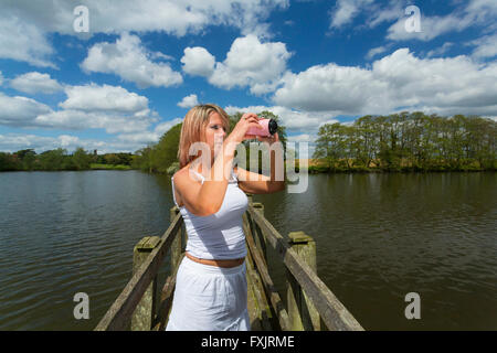 woman taking photos Stock Photo