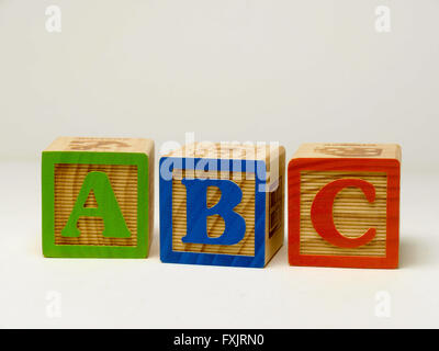 Kid's building blocks spelling the word abc. Stock Photo