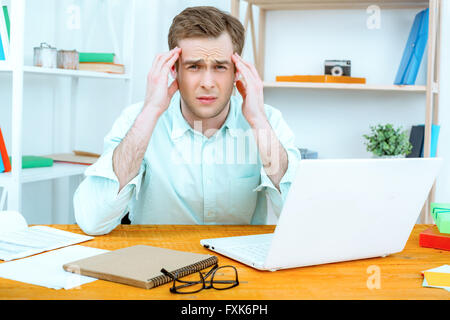 IT programmer working with laptop Stock Photo