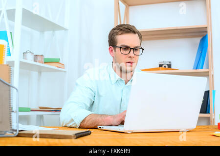 IT programmer working with laptop Stock Photo
