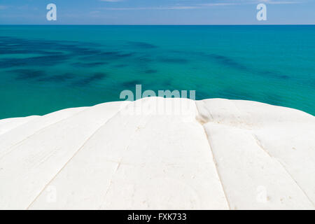 White limestone, rock marl on turquoise sea, Scala dei Turchi cliffs, Realmonte, Province of Agrigento, Sicily, Italy Stock Photo