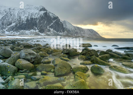 Scenic pebble beach in Eggum, Lofoten Islands, Arctic, Norway, Scandinavia, Europe on a cloudy, winter day. Stock Photo