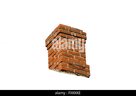 Old weathered brick stone chimney isolated on white Stock Photo