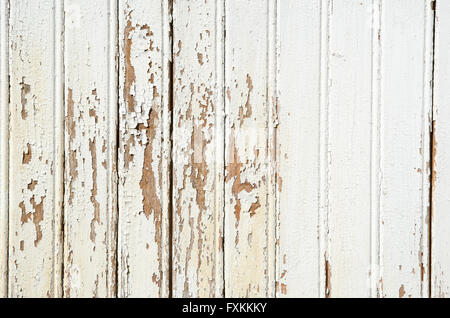 Background of an old white wooden wall with cracked painting Stock Photo