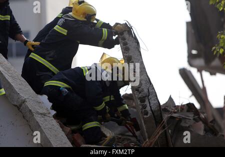 Beijing, China. 17th Apr, 2016. Rescuers search for trapped people at the building collapse site in Xixia Road of Shanghai, east China, April 11, 2016. A three-storey roadside building in Songjiang District of Shanghai collapsed at 12:50 p.m. on April 11. © Xinhua/Alamy Live News Stock Photo