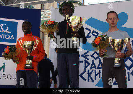 Belgrade, Serbia. 16th Apr, 2016. Abel Rop Kipruto of Kenya (C) poses during the awarding ceremony after the 29th Belgrade Marathon in Belgrade, Serbia, on April 16, 2016. Kipruto won the men's gold medal with a time of 2 hours 23 minutes and 59 seconds. © Nemanja Cabric/Xinhua/Alamy Live News Stock Photo