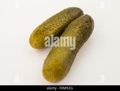 Close up of two delicious pickles isolated on white background Stock Photo