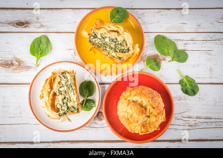 Spanakopita - Greek spinach pie with feta and ricotta, top view Stock Photo