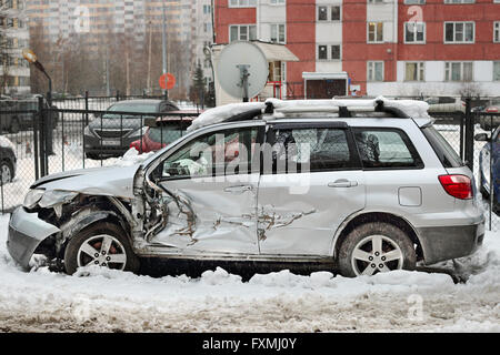 Passenger car after a accident in difficult road conditions in winter Stock Photo