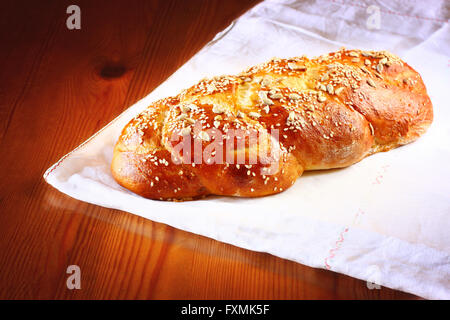 challah bread on wooden table. Stock Photo