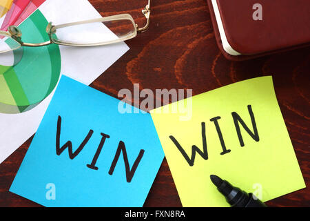 Win-win written on papers. Business concept. Stock Photo