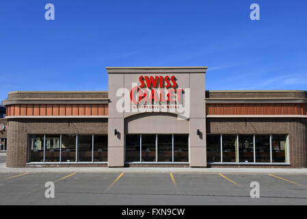 Ottawa, Canada - April 17, 2016:  Swiss Chalet is a popular Canadian casual dining chain.  It was founded in 1954 in Toronto. Stock Photo