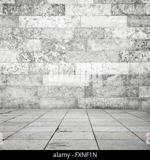 Abstract empty interior background, stone floor tiling and white decorative wall Stock Photo